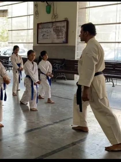 A Sunday well spent at our St. Mary's dojo. An instructor guides a group of young girls through their stances, ensuring they build a strong and correct foundation from the very beginning.