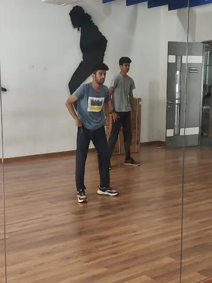 A moment of instruction during the IIITB dance club training. We work on posture, balance, and the core principles of hip-hop movement.
