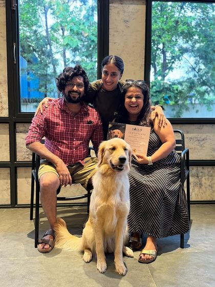Pixel the Golden Retriever's graduation day with her family. It's a joy to see them so happy and connected.