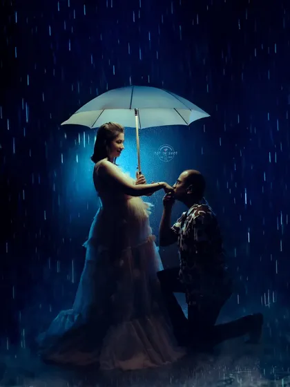 Love shines brightest even in a storm. This creative couple's maternity portrait uses a dramatic rain effect to create a romantic and cinematic moment, showcasing our ability to craft unique, story-driven images.