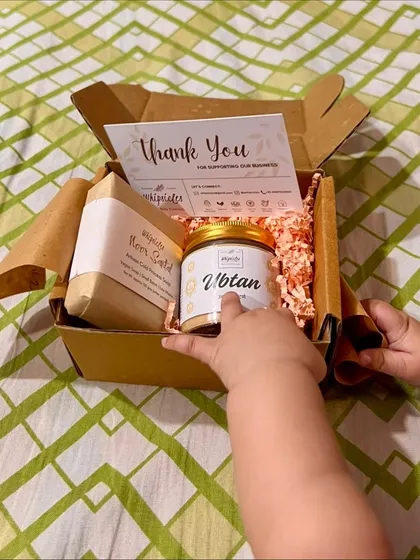 Sometimes, the most meaningful gifts are the ones that mark personal milestones. This little hand reaching for one of our gift boxes captures the joy and love that we pour into every order, making each one feel like a gift for our own family.