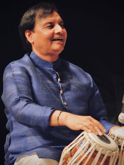 Another still from the Taal Chakra concert, a moment of happiness while playing for an appreciative audience.
