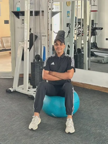 A confident pose on the stability ball. A strong core provides the balance for everything else.