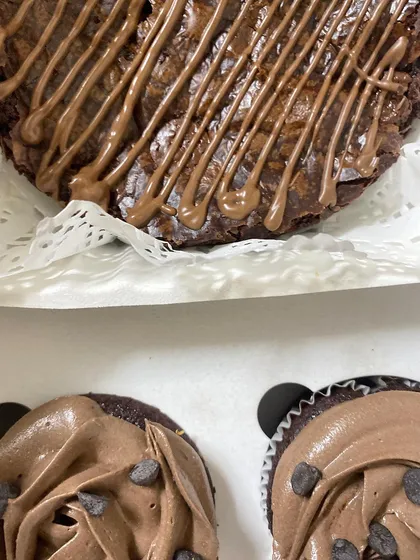 Another look at our brownie and cupcake combo, showing the rich texture of the brownie and the creamy swirls of the cupcake frosting.