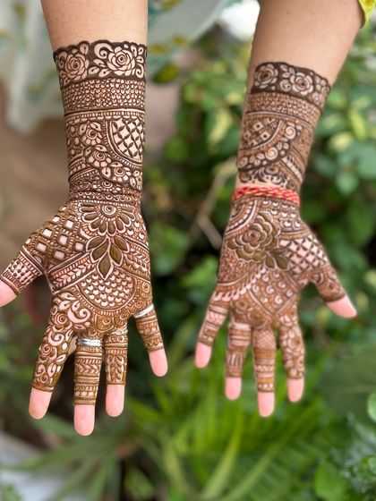 A close-up of one of the designs, featuring a beautiful scalloped border and intricate finger work.