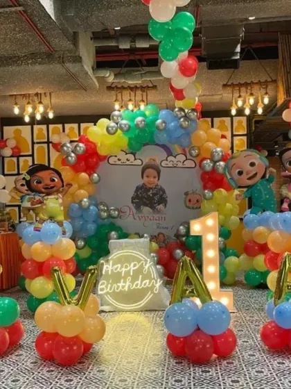 Look at this huge Cocomelon theme party I did for a first birthday! I can transform any hall into a colorful wonderland with balloon arches, character cutouts, and big light-up letters for your child's name. It’s all about creating that "wow" moment.