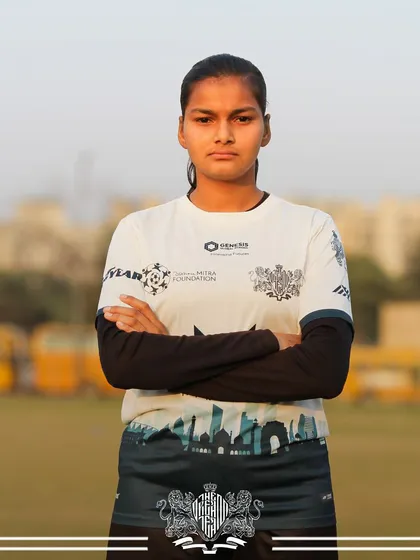 Focused and ready. A player from our women's team, demonstrating the mental preparation required for success.