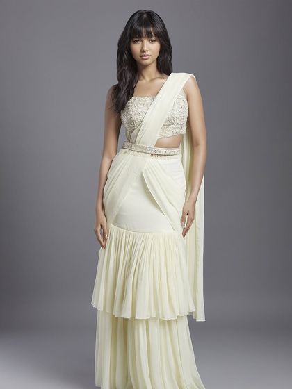 This extensive collection features a wide array of modern festive attire. From vibrant sharara sets and elegant anarkalis to chic jumpsuits and light lehengas, these pieces are curated for wedding guests and anyone looking for a stylish outfit for a special occasion.