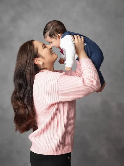 A mother's love, lifting her baby high. These playful, interactive shots result in the most beautiful, natural smiles and connections.