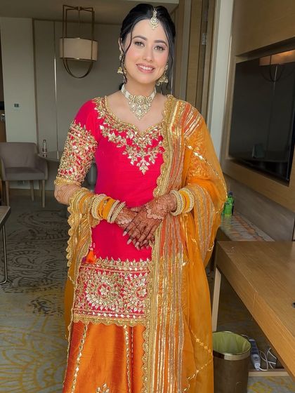 The full Haldi look. Shweta's bright outfit is the star, supported by a clean and simple makeup application that lets her glow.