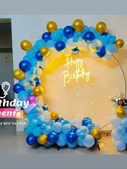 A bright and cheerful blue and gold balloon ring, perfect for adding a pop of color to your celebration.