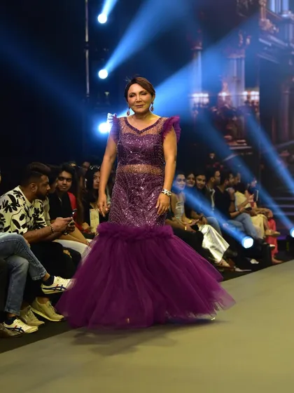 From my "Jashn-e-Ishq" runway collection, this plum purple mermaid gown is pure glamour. The hand-embellished details and ruffled tulle bottom create a stunning silhouette for any formal event.