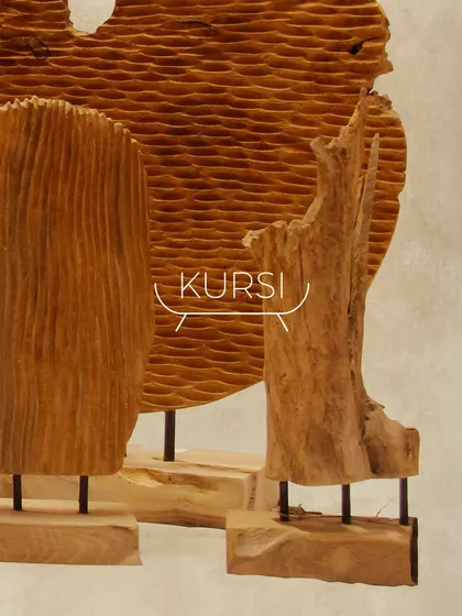 This image shows a grouping of my handcrafted wood artifacts. The different textures, from ribbed carvings to smooth, natural driftwood forms, create a visually rich display.