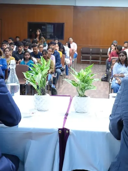 A view from the stage, showing our students actively engaged during the Q&A session of the journalism workshop.