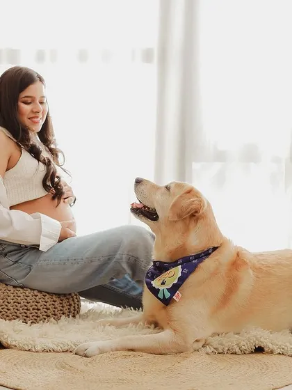A heartwarming moment between a mother-to-be and her loyal dog. These are the moments of connection we love to capture.