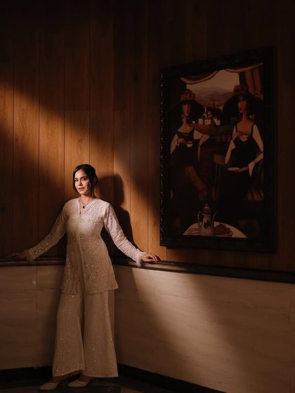 A dramatic shot playing with light and shadow. This photo from a recent shoot shows a more artistic and contemplative side, demonstrating my range as a model for more thematic or high-fashion concepts.