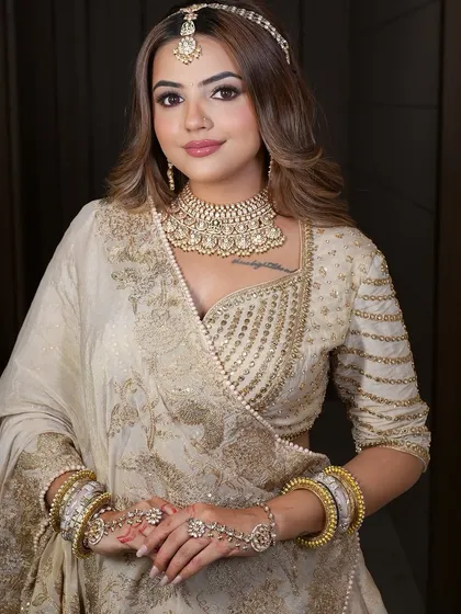 A confident and happy model, her smile radiating as much as her jewellery.