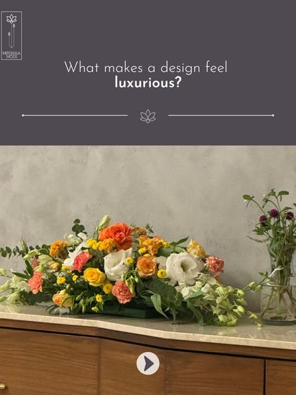 What makes a design feel luxurious? It's the mastery of fundamentals. This low, horizontal arrangement showcases an understanding of color harmony and composition, creating a feeling of effortless elegance.