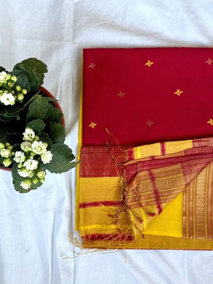 A festive red and yellow Maheshwari saree with star-shaped butti work, perfect for celebrations.