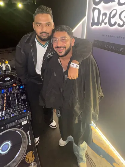 Posing with a friend at the GQ Best Dressed event. These high-profile parties are also great opportunities to connect with people from different industries.