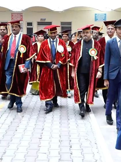 The ceremonial procession entering the auditorium, led by the college band. A grand start to a momentous day.