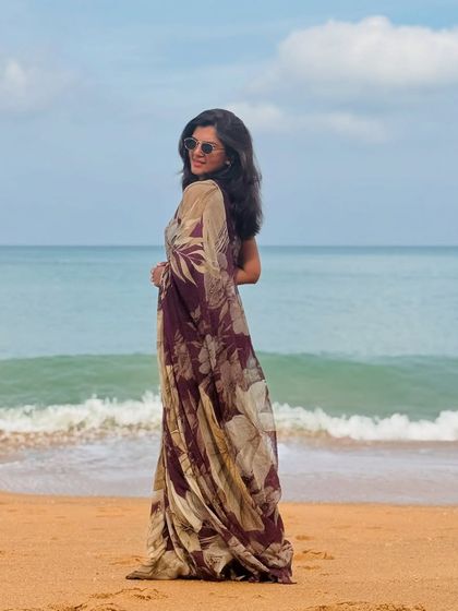 Draped in love. A beautiful shot of me in a pure georgette digital print saree, perfect for a breezy day by the beach.