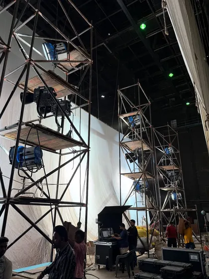 Behind-the-scenes of a Big Boss promo shoot. This image shows the scaffolding and rigging used to position our powerful Nanlux 5000B and ARRI M90 lights for optimal coverage.