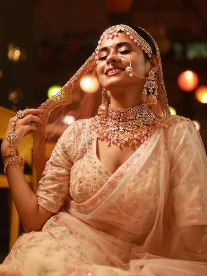 A moment of pure bliss. The bride's makeup is designed to look beautiful and natural, even in candid moments.