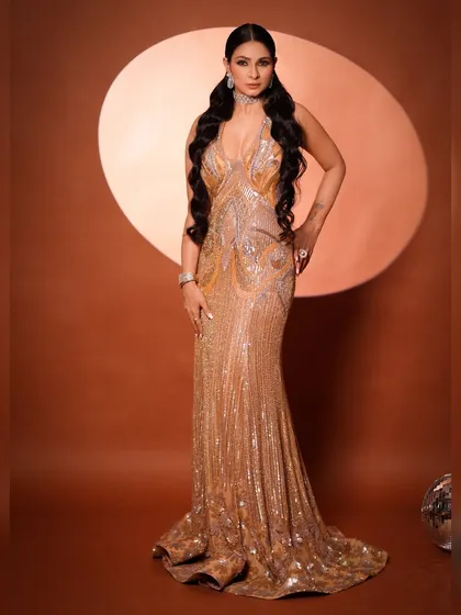 A final full-length shot that captures the essence of this high-fashion look. It's all about sparkle, confidence, and owning the spotlight.