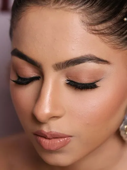A close-up of a soft, natural glam look created in my masterclass. Notice the seamless skin finish, the clean winged liner, and the perfectly defined nude lip, all techniques we master in the course.
