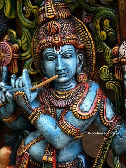 A close-up of the face of the 48-inch blue Krishna wall panel, showing the vibrant color and serene, powerful expression.