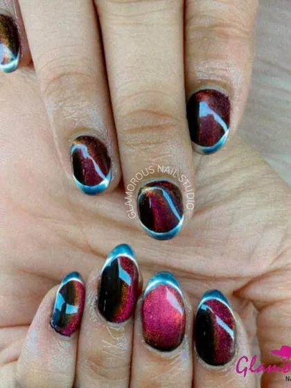 A mesmerizing cat-eye effect in shades of deep red and blue, creating a galaxy-like look that shifts in the light.