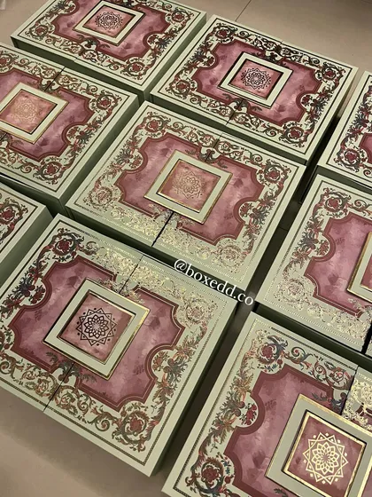 An array of our exquisite, custom-designed boxes for The Belgian Waffle Co. The intricate pattern and high-quality finish reflect the premium nature of the gifts inside.