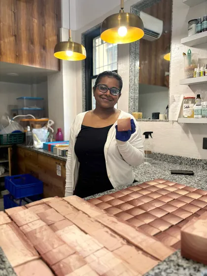 Here I am in my element, surrounded by hundreds of freshly cut soap bars. From a tiny 10x10 studio to this, our journey has been incredible, and it's all thanks to your support for our small, all-girl team.
