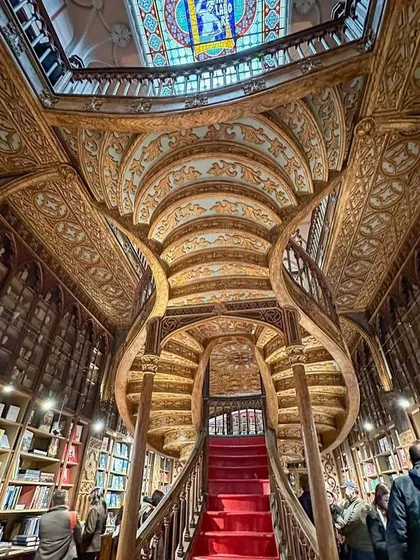 Another perspective of the magnificent staircase and carved ceilings at Livraria Lello. The sense of history and grandeur is overwhelming. Places like these are a reminder of how powerful and timeless great design can be.