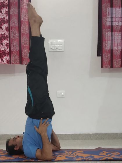 Sarvangasana (Shoulder Stand) is a powerful inversion that benefits the circulatory and endocrine systems. We guide students into this pose with careful attention to neck safety and proper alignment.