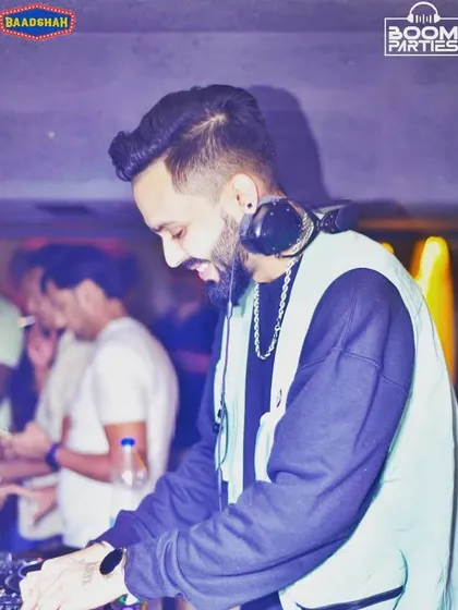 Expect nothing, appreciate everything. A side profile of me at the console, focused on the music and the moment.