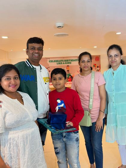 A happy family moment at our Abacus prize distribution program. I always encourage parents to be a part of their child's academic journey and celebrations.
