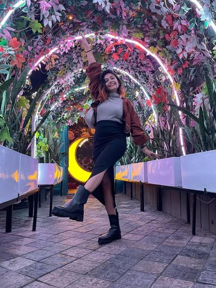 If life gives you lemons, add vodka. A fun night out in a cozy turtleneck, slit skirt, and chunky boots.