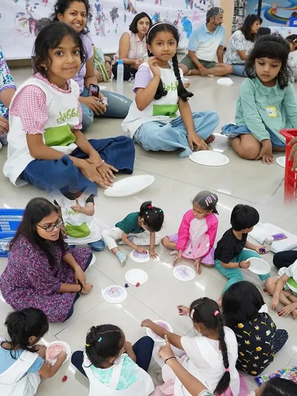 Little artists deep in concentration during a crafting session. We provide all the materials, so all you need to bring is your imagination.