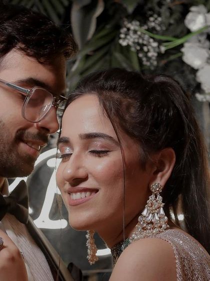 A close-up shot that focuses on the bride's happy expression and the groom's loving gaze. Capturing these micro-expressions is key to showing the genuine connection between a couple on their big day.