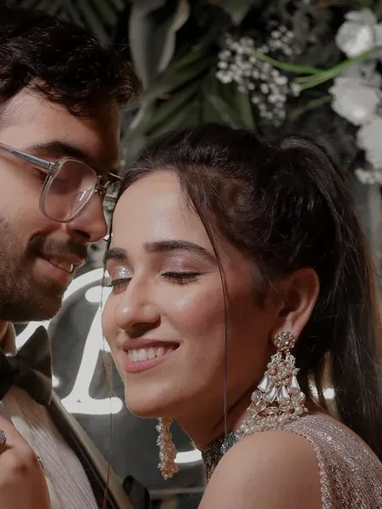 A close-up shot that focuses on the bride's happy expression and the groom's loving gaze. Capturing these micro-expressions is key to showing the genuine connection between a couple on their big day.