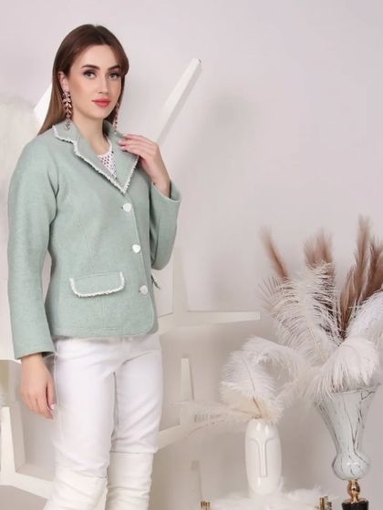 A light green blazer with white trim modeled for an e-commerce listing, highlighting formal or semi-formal wear.