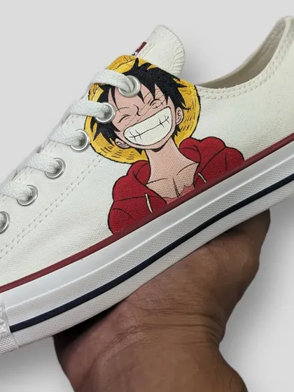 A clean and minimal custom featuring Monkey D. Luffy from One Piece on a pair of Converse Lows. Sometimes a simple portrait is all you need to show your love for a character.