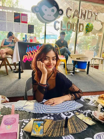 Here I am in my element at a pop-up event. This is my safe space, where I connect with you, and the cards tell their story. It's always an honor to hold this space for you in person.