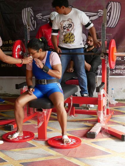 Taking a moment before a bench press attempt at the District Level Powerlifting Championship. Focus is key.