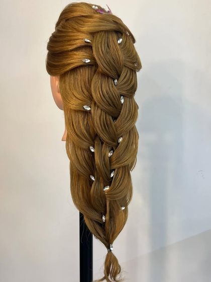 Another variation of the intricate pull-through braid, this time adorned with sparkling crystals.