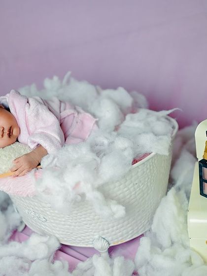 A full view of the newborn spa theme, complete with a makeup palette prop for a touch of glamour.