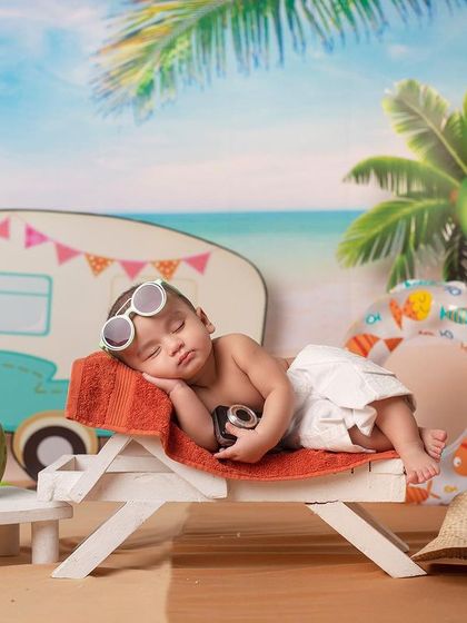 A duplicate of 125, showing the adorable sleeping baby in our summer beach theme.