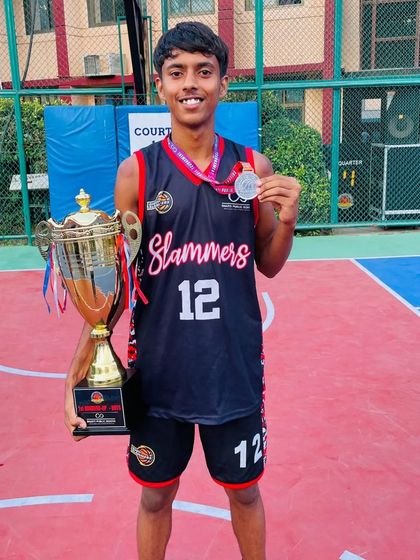 Every step you take fills my heart with pride. This young player with his trophy and medal has a long and bright future ahead.